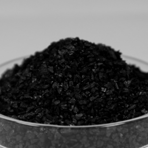 How is activated carbon used in waste water treatment?